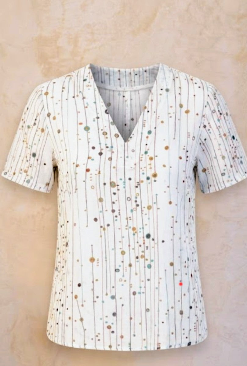 Blusa Claudina realizzata in tessuto a righine colorate su fondo bianco 
